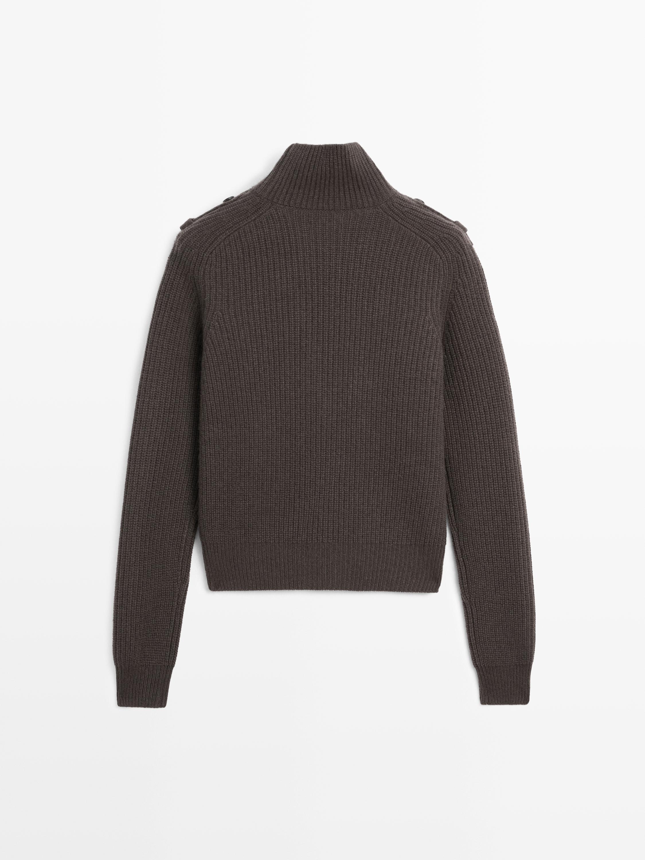 Knit sweater with shoulder detail